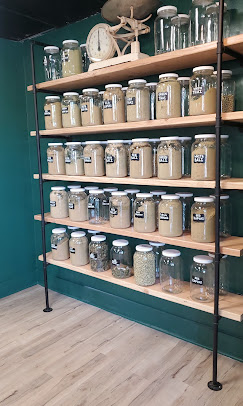Botanical powder wall at the Acadia Botanicals Monroe Avenue store