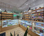 Wide interior view of the Acadia Botanicals Penfield showroom