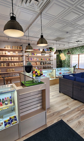 Product shelves and service area inside Acadia Botanicals Victor