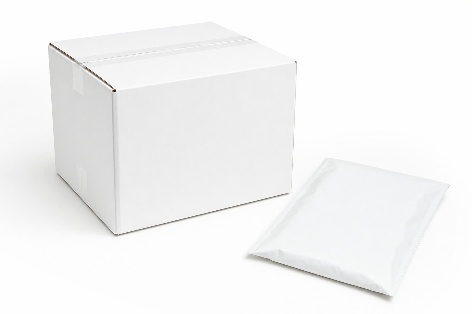 A plain white shipping box and flat mailer on a bright white surface.
